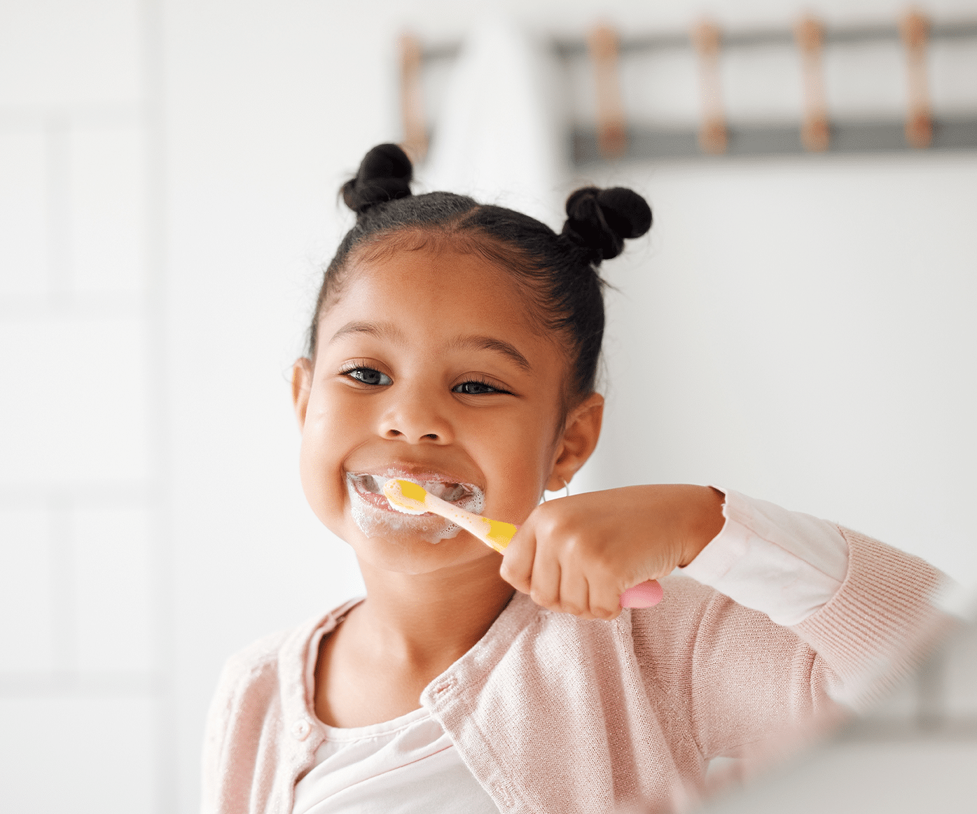 child brushing her teeth in new orleans la